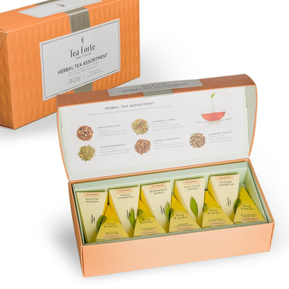 Opened Tea Forte Herbal Tea Assortment box with yellow tea sachets and assortment panel