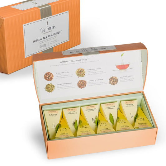 Opened Tea Forte Herbal Tea Assortment box with yellow tea sachets and assortment panel