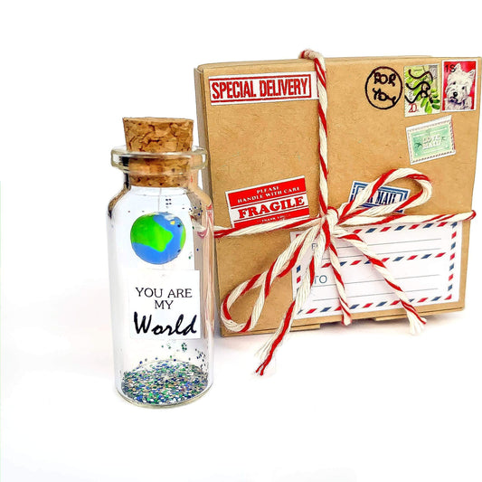 Mini message in a bottle keepsake with cork, inside a wrapped craft gift box