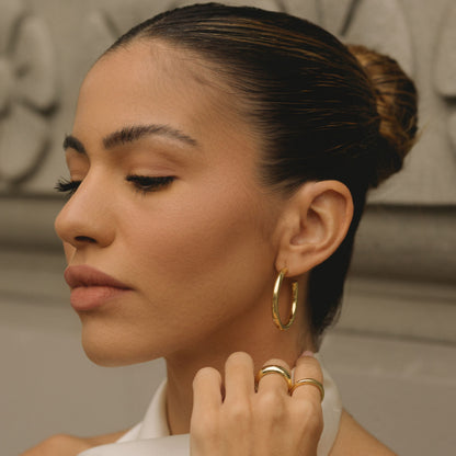 Gold-filled 30mm hoop earrings, oversized polished hoops on ear