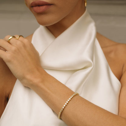 Gold filled diamond bezel bracelet on wrist