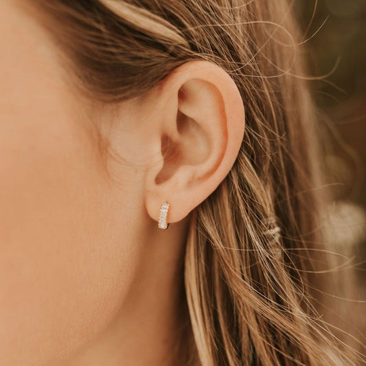 Ivy Diamond Hoop earrings with clear stones, worn singly