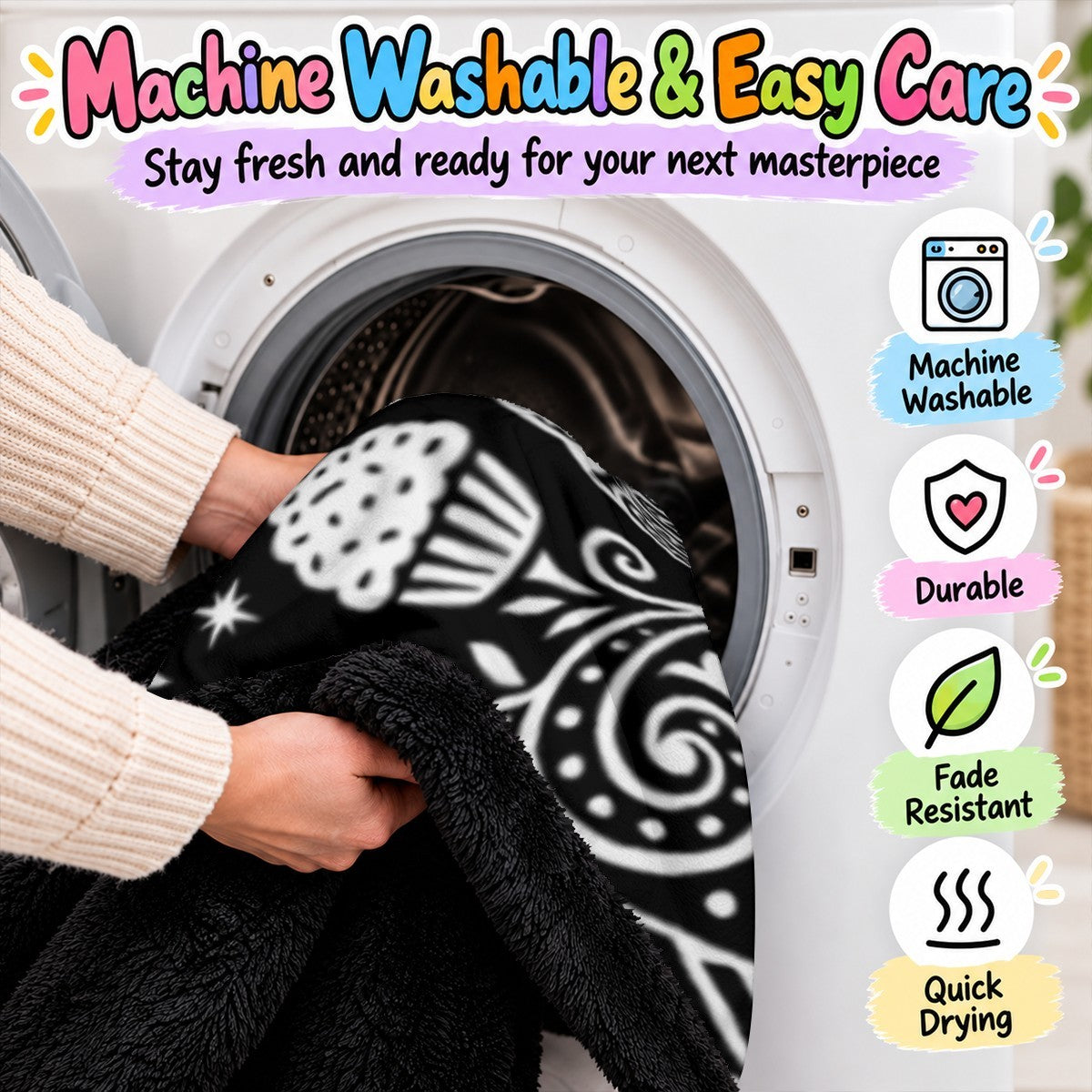Black-and-white doodle blanket being placed into a washing machine for cleaning