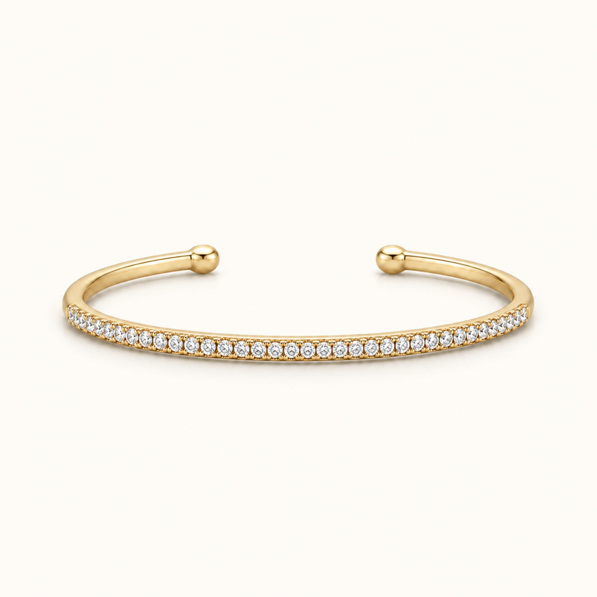 Gold filled thin pavé cuff bracelet with round end caps