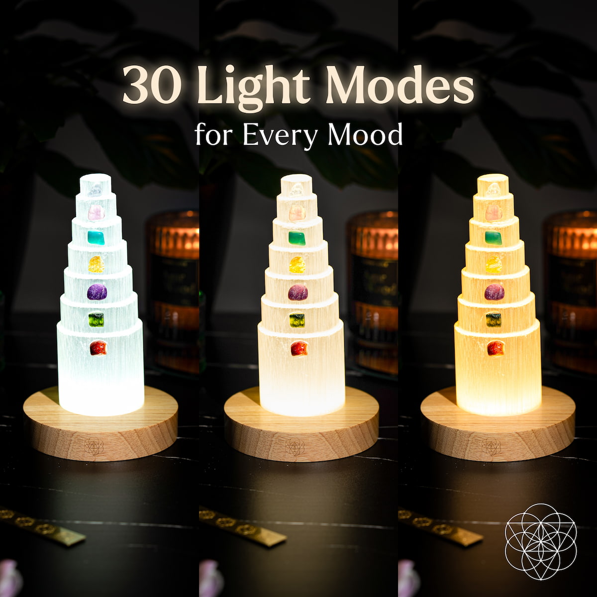 Three stacked-tier glow tower lamps on round wood bases, showing different colors