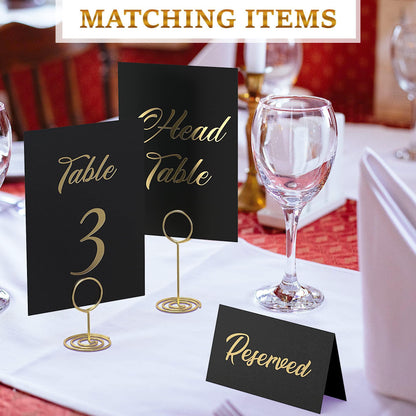Black cards with gold foil “Head Table” and “Table 3,” plus “Reserved” card