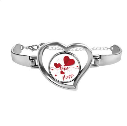 Heart charm bracelet with silver heart locket and red heart design reading "Love Hamna"