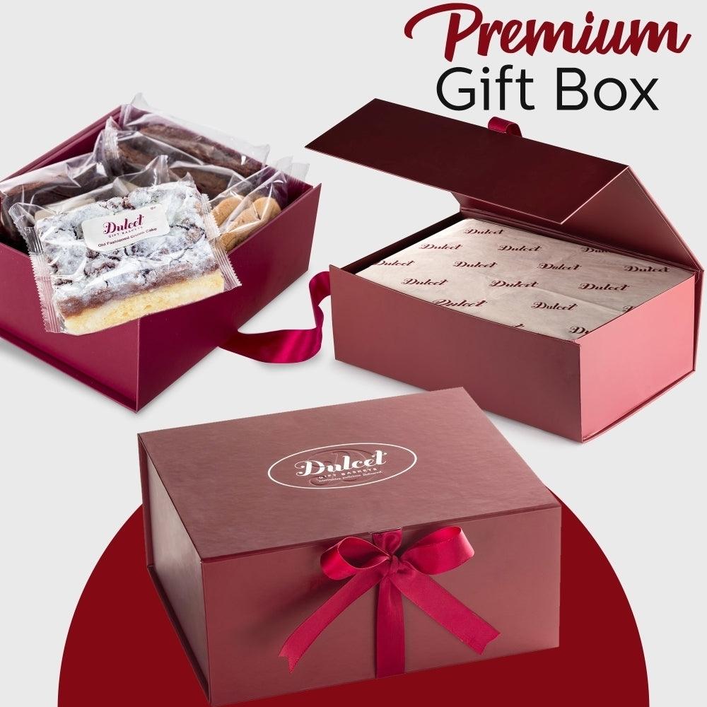 Premium gift box with maroon lid, ribbon bow, and wrapped cookies
