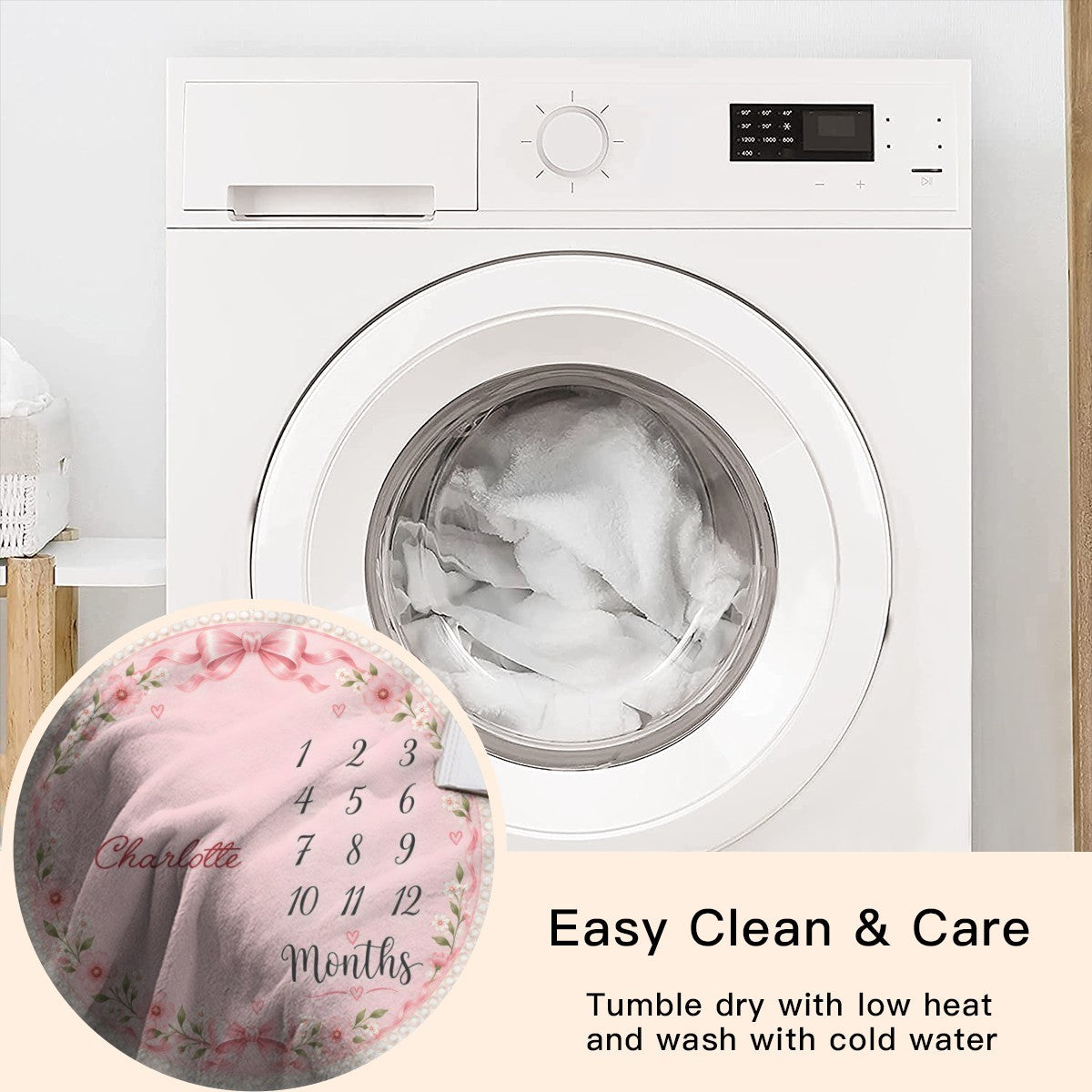 Pink round milestone blanket near front-load washer, floral edge and name Charlotte