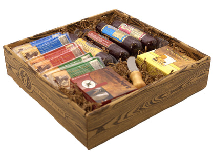 Wooden gift basket with assorted sausages, salami, cheeses, and crackers