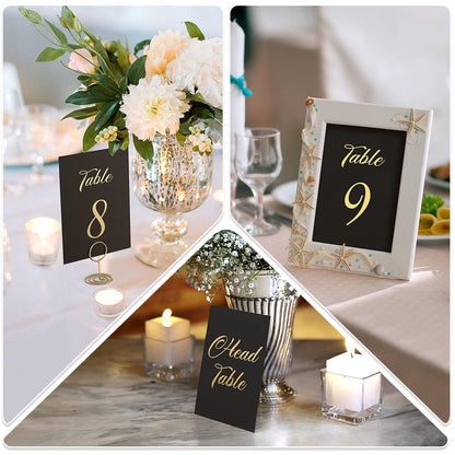 Black table number cards with gold foil “Table 8,” “Table 9,” and “Head Table”