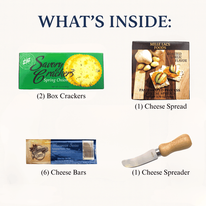 Assorted cheese gift contents with cracker and cheese packages and a wooden cheese spreader