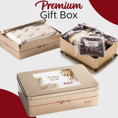 Premium gift box with two tins and wrapped cookies, ready to gift