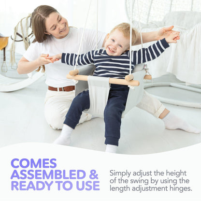 Gray canvas baby hanging swing seat with wooden bars and height-adjustment buckles