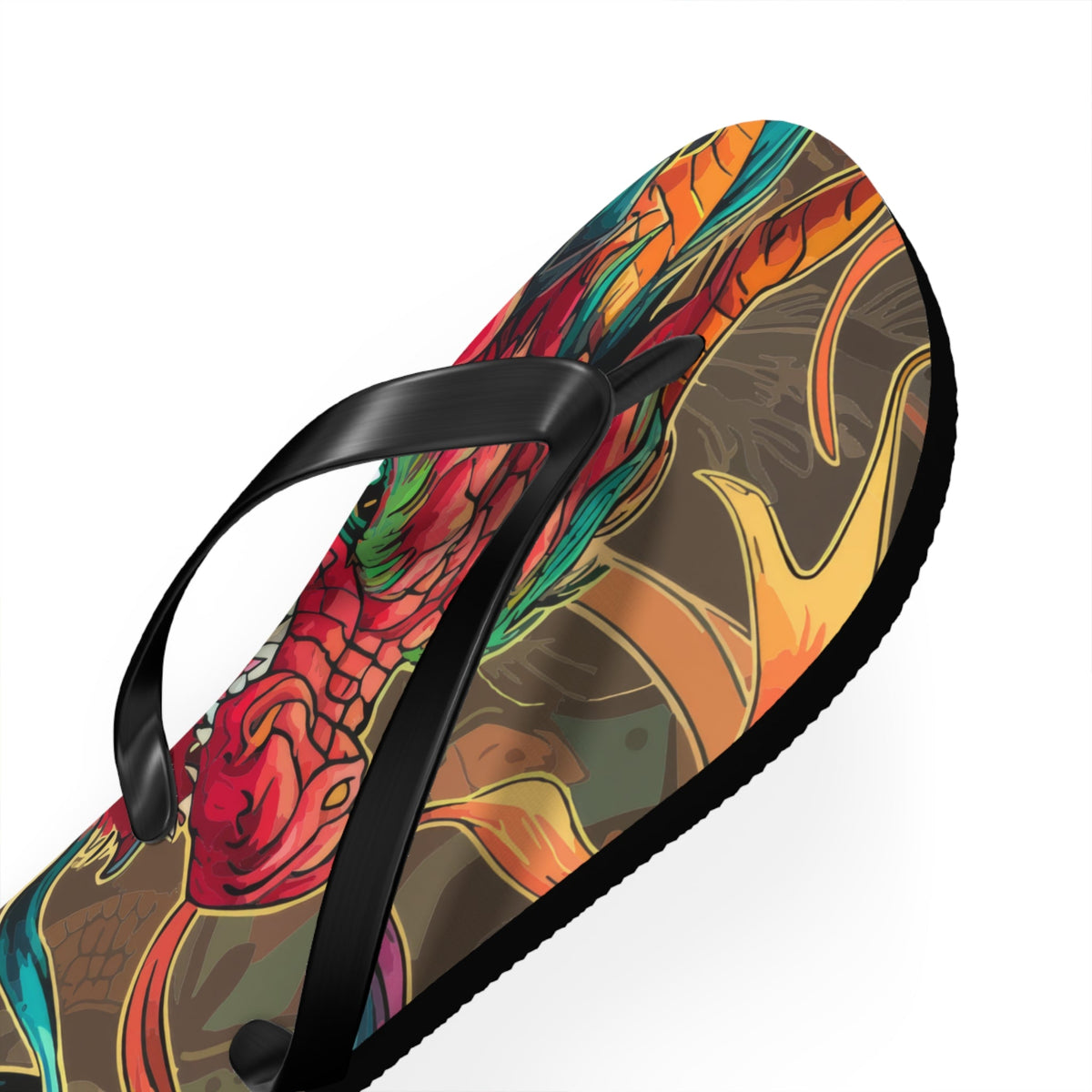 Angled close-up of dragon graphic flip-flop with black thong strap and sole