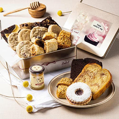 Deluxe Honey & Pastry Gift Tin open with mixed cookies, honey jar, and cake slice
