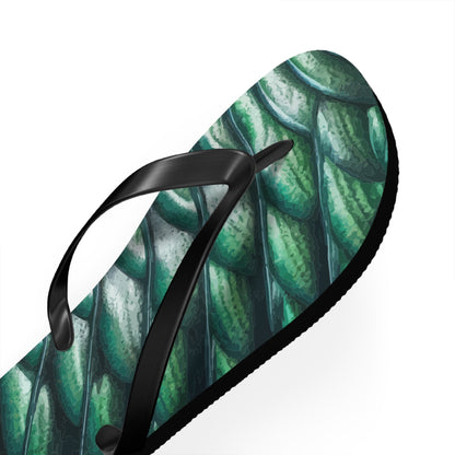 Angled view of green merman scales flip flop with black thong straps and thick sole