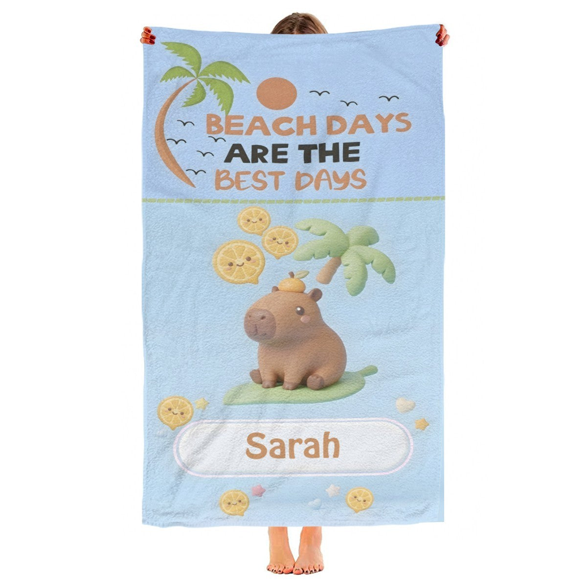Light blue beach towel with bear, palms, lemons, 'Beach Days' text, and Saran label.