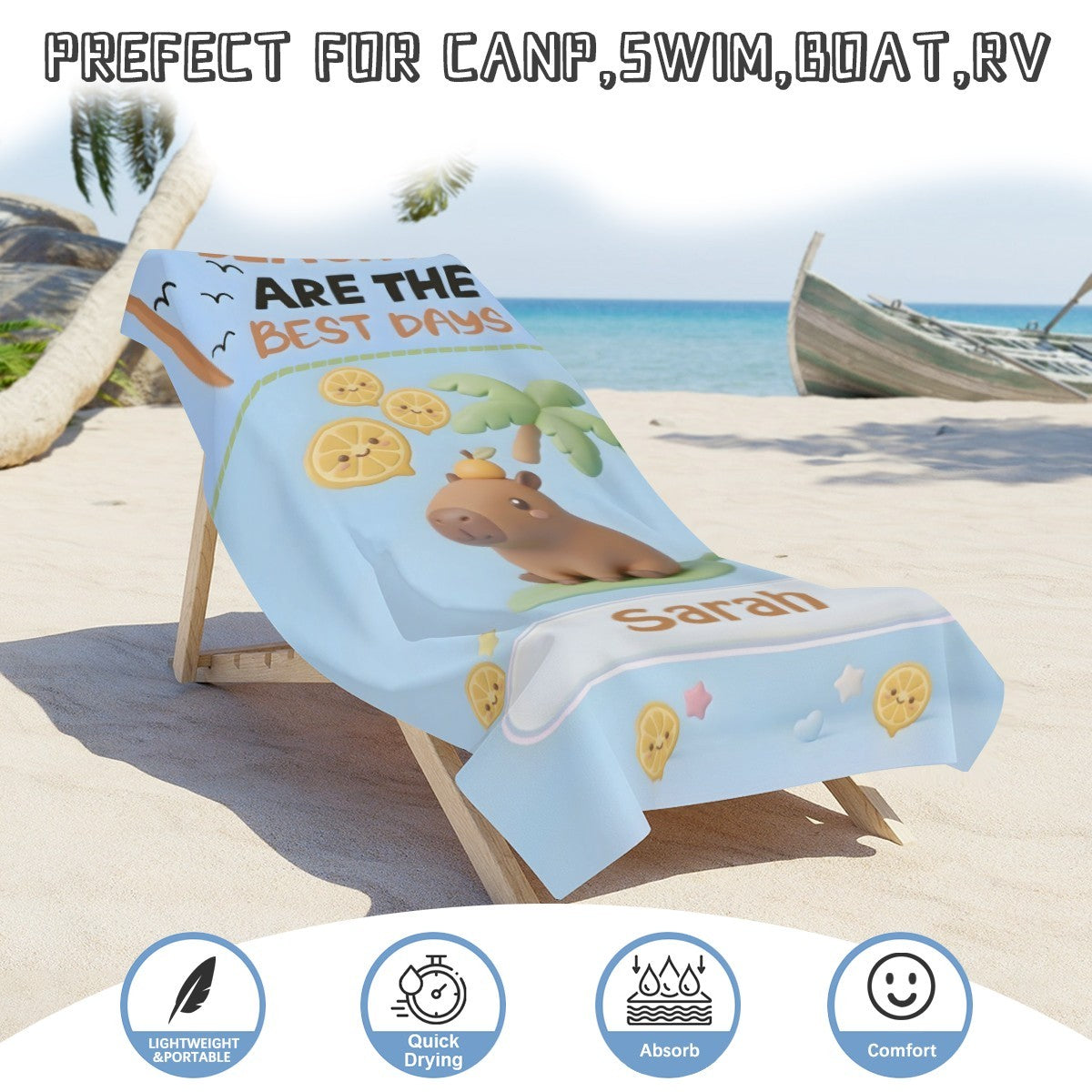 Light blue beach towel folded, featuring bear, lemons, palms, and Saran patch.