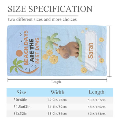 Light blue beach towel with bear and Saran patch; size options 30x60–33x52 in.
