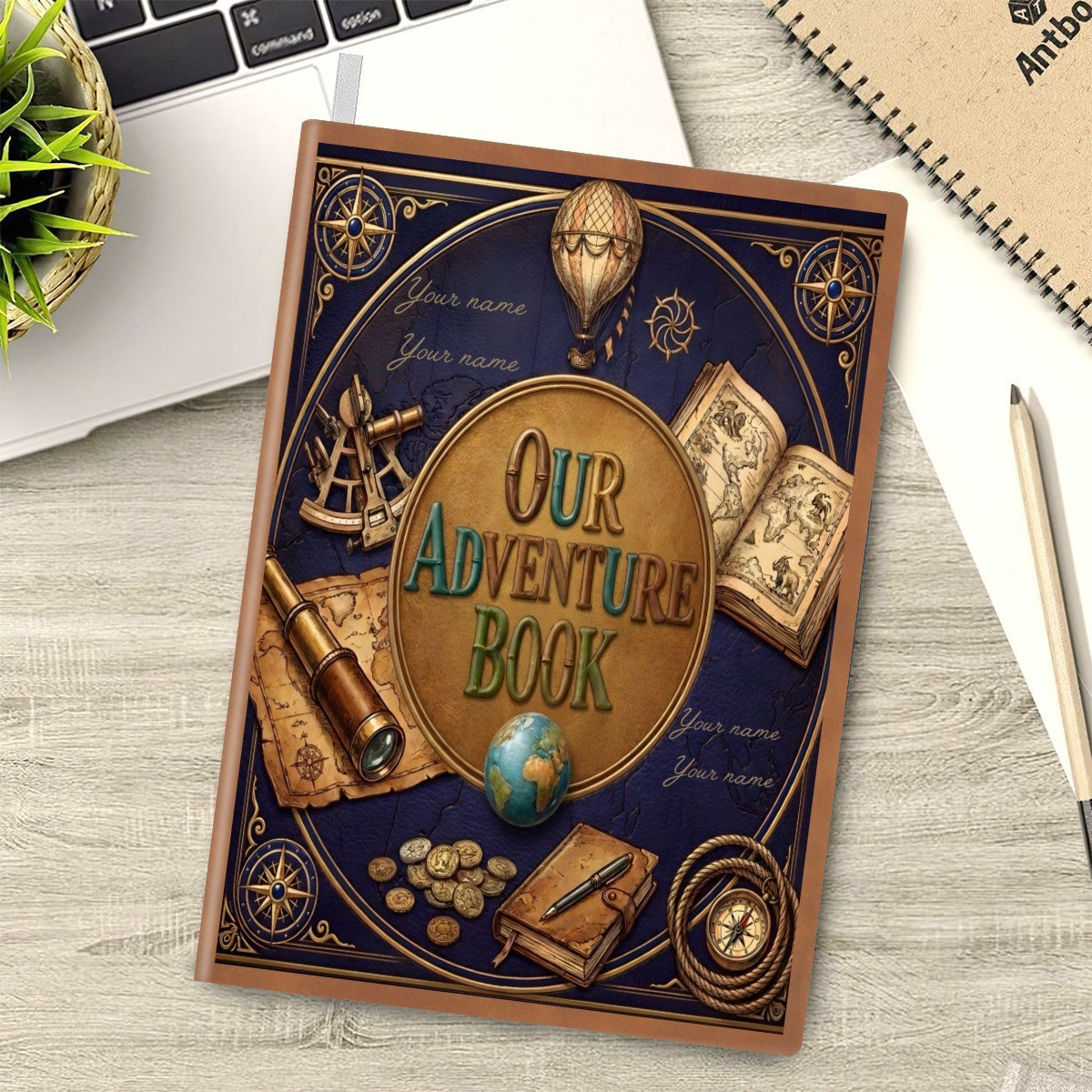 Adventure notebook lying on a desk with navy themed cover art