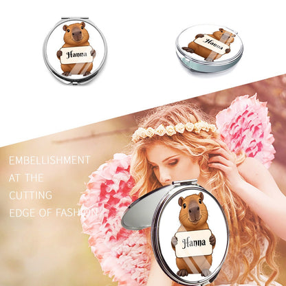 Capybara compact mirror shown closed and open