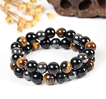 Beaded bracelet with glossy black beads, brown tiger-eye accents, and silver-tone hematite