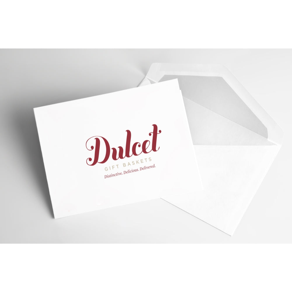 Stacked white gift message envelopes featuring the Dulcet logo