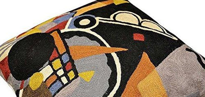 Black abstract pillow cover corner detail with colorful geometric embroidery