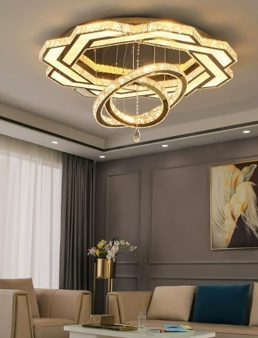 Gold crystal flush mount chandelier with glowing ring layers and hanging crystal