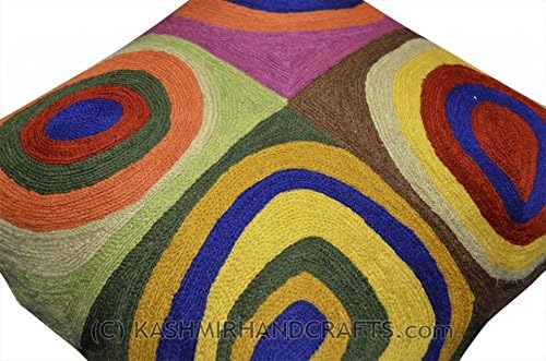 Wool pillow cover, diagonal view, multicolor abstract rings on purple, green, and brown