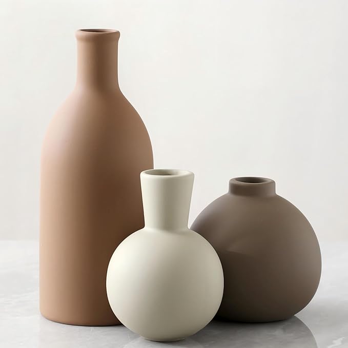 Set of 3 matte ceramic vases in terracotta, white, and taupe, rounded shapes