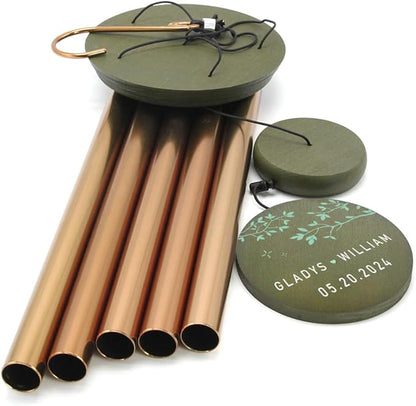 Copper-gold wind chime with dark green personalized round anniversary disc
