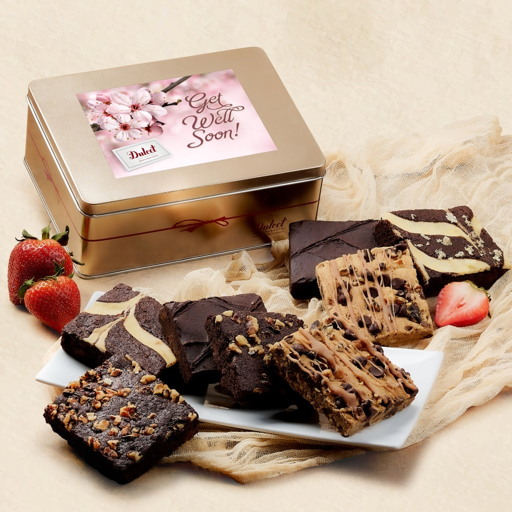 Gold gift tin with brownies and a Get Well Soon greeting card topper