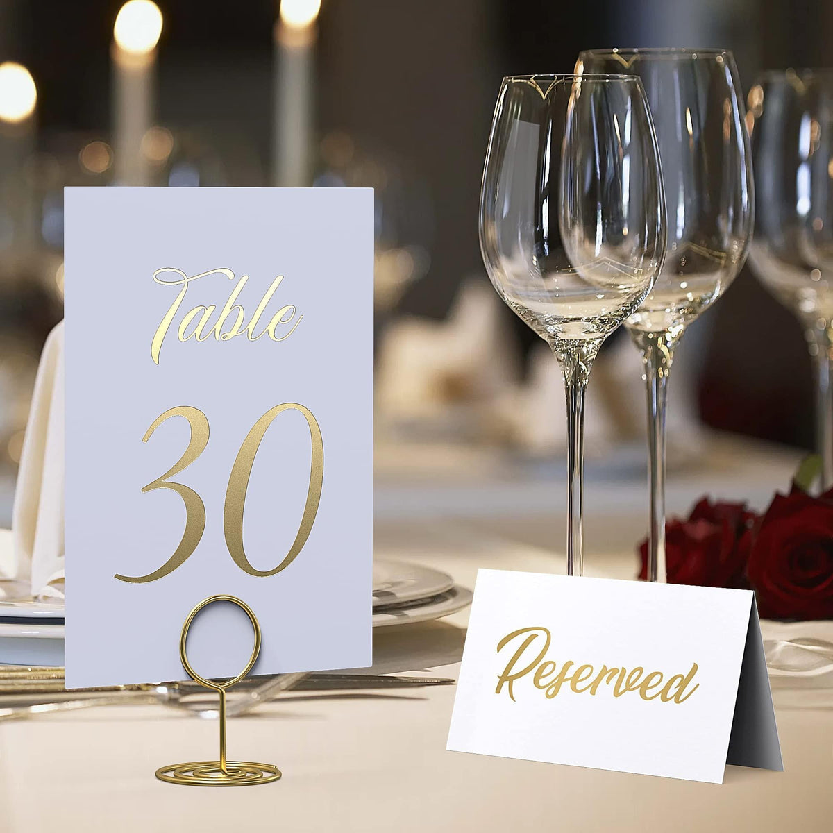 Gold foil table number card “Table 30” with a “Reserved” place card
