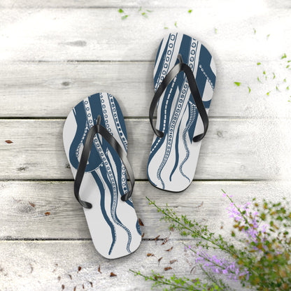 Pair of blue octopus print flip-flops with black straps and white footbeds