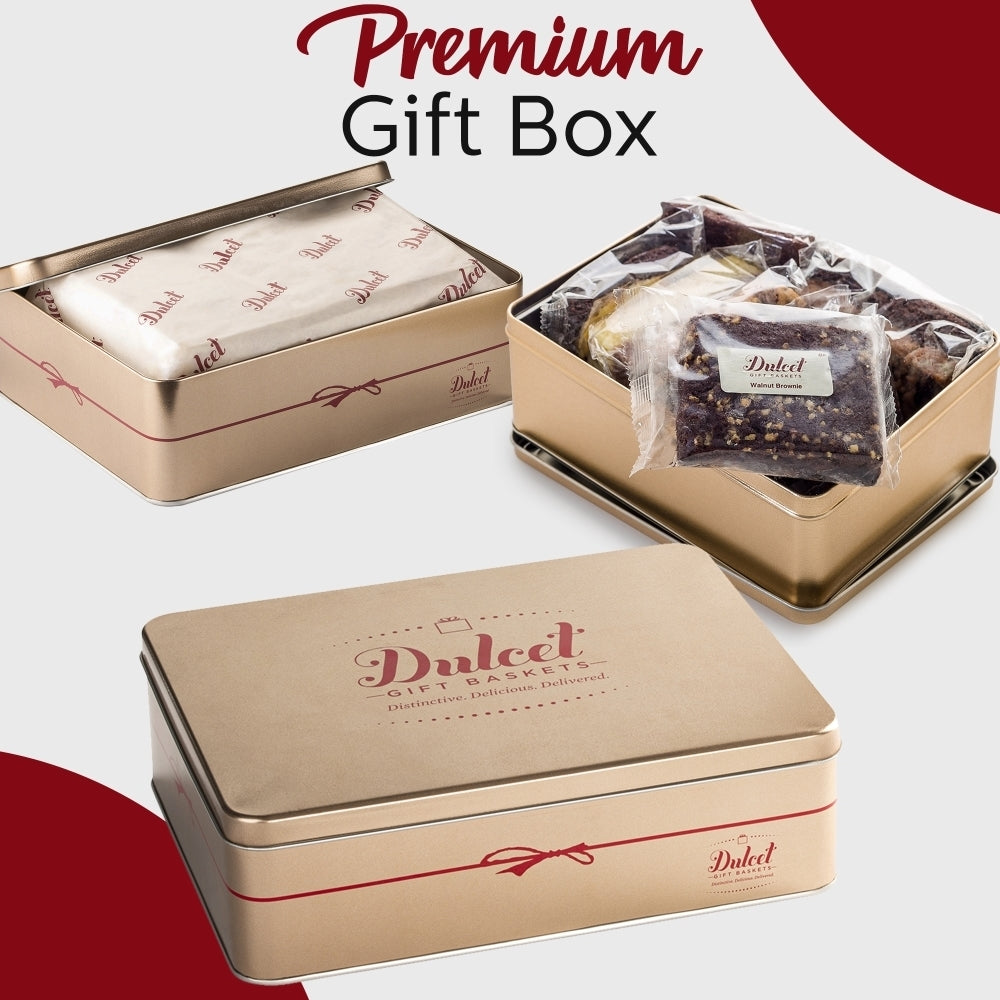 Metal gift tins labeled Daldet; one open with wrapped cookies and Premium Gift Box card