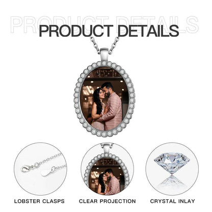 Silver oval photo pendant necklace detail view, crystal halo around clear photo window