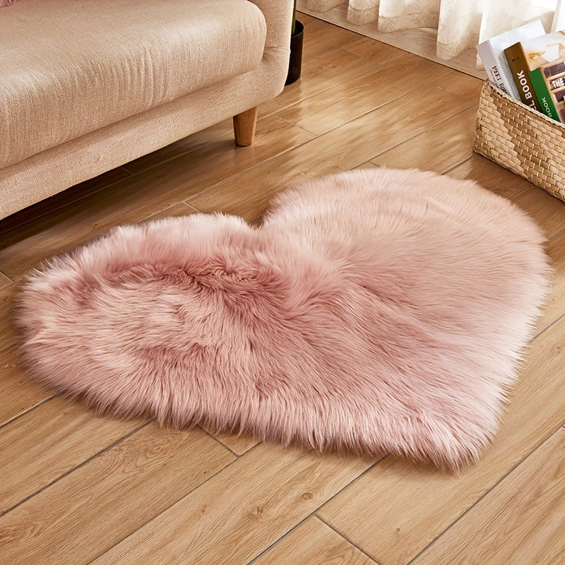 Pink heart-shaped plush area rug with soft faux wool pile