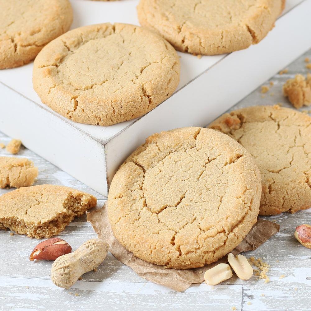 Deluxe Honey & Pastry assortment: round peanut butter cookies on parchment-lined tray