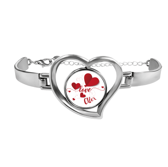 Heart charm bracelet with silver heart locket and red heart design reading "Love Ola"