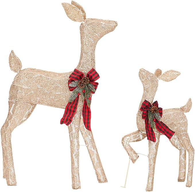 Pair of golden shimmering reindeer decorations with red plaid bow ties and warm light