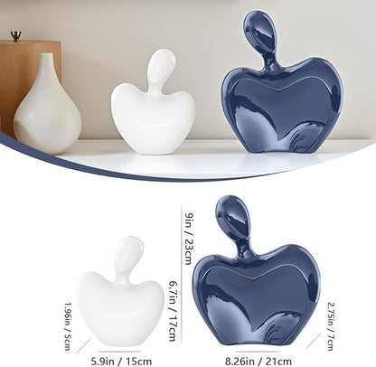 Ceramic couple figurines set: blue and white hugging heart shapes with size labels shown.