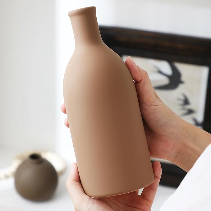 Ceramic vase set of 3, matte tan tall vase held in a hand