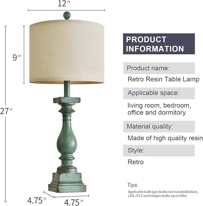 Tall view of green resin table lamp with round beige fabric shade