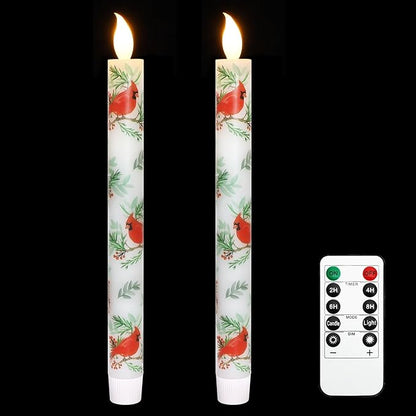 LED taper candles with warm light, white with red cardinal and green leaf pattern.
