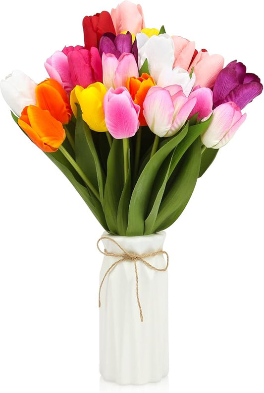Artificial tulip bouquet with multicolor blooms in a white plastic vase tied with twine