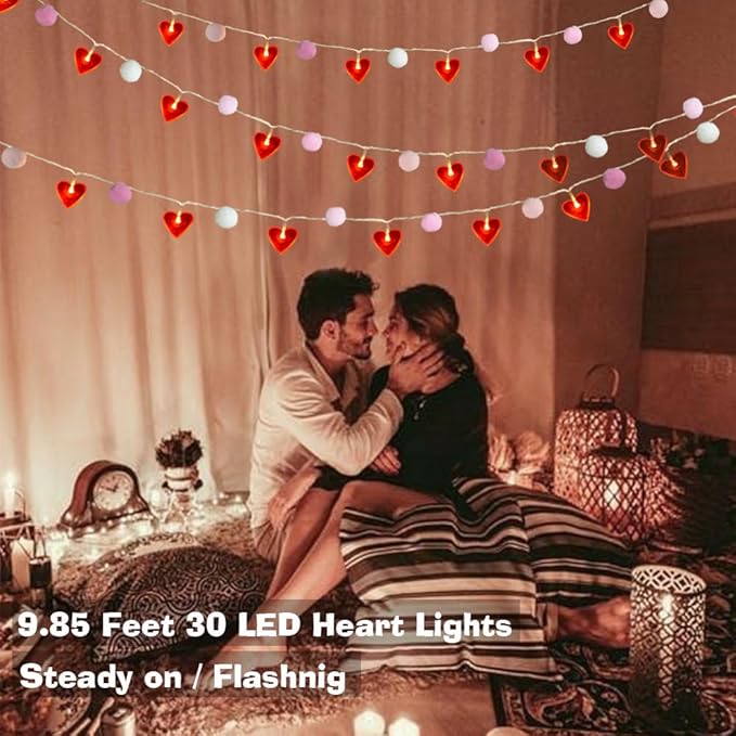 Heart LED string lights garland with red hearts and pink pom poms, hanging decor