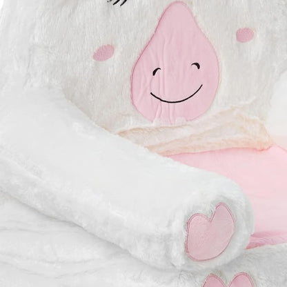 Unicorn plush toddler chair close-up: pink unicorn face on soft white side cushion