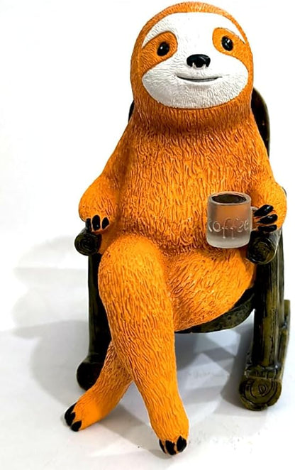 Solar light sloth figurine sitting, holding a small cup near glowing light.
